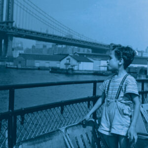 Archive image of boy looking at the Manhattan Bridge, 1930s